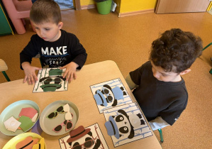 Stefan i Illya ubierają pandy